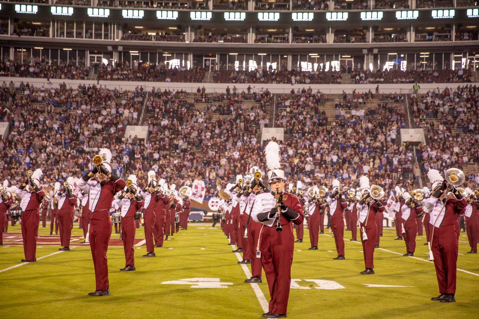 Mississippi State University Famous Maroon Band performing on the field.