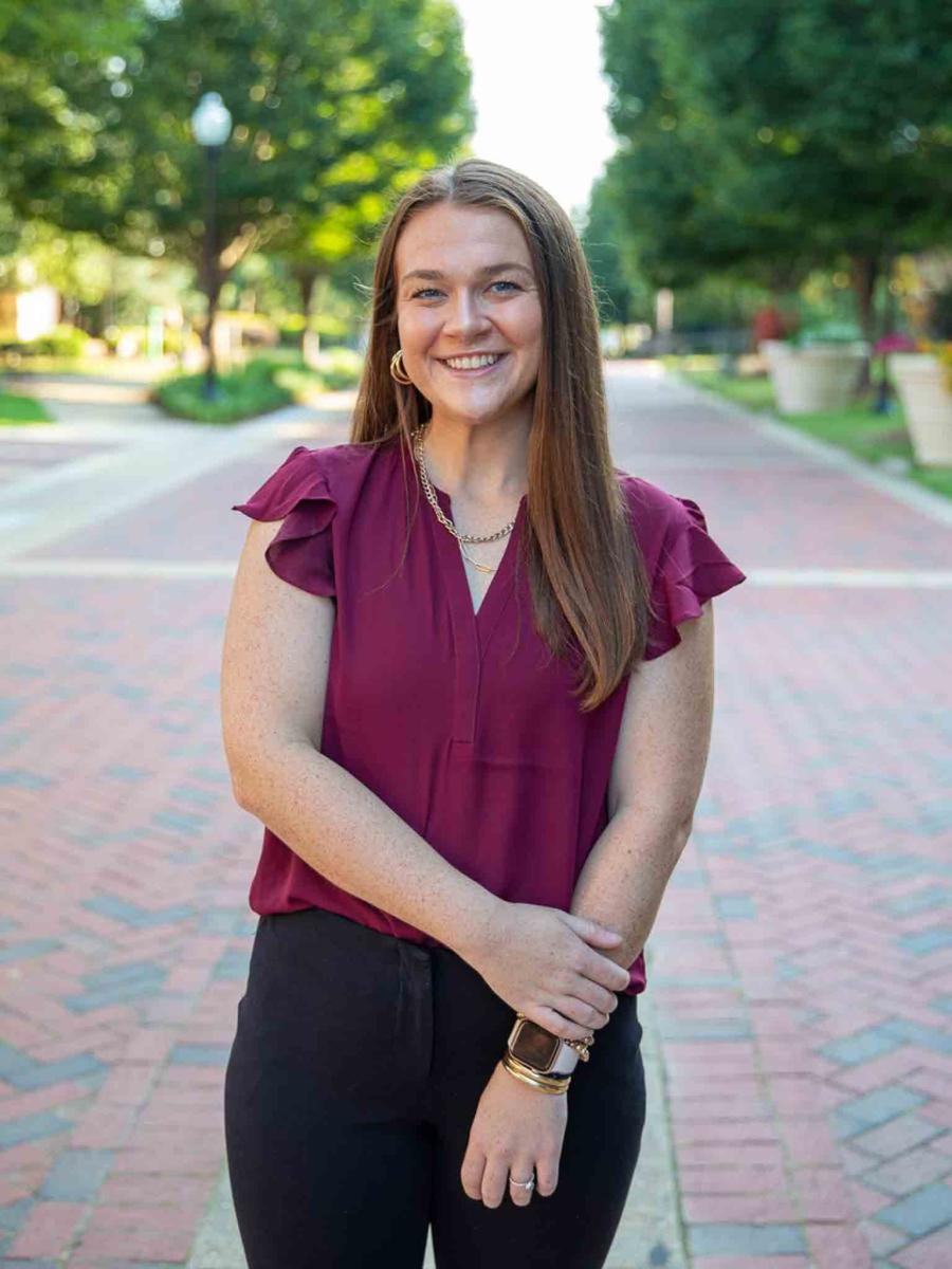 Mississippi State University professional headshot of a woman with brown hair wearing a maroon top. 